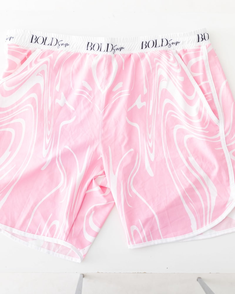 Front of a size 2X Retro Swim Shorts in Pink by BOLD Swim. | dia_product_style_image_id:270922
